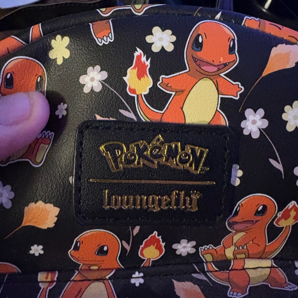 Loungefly Charmander Patterned Black and Orange Mini Backpack